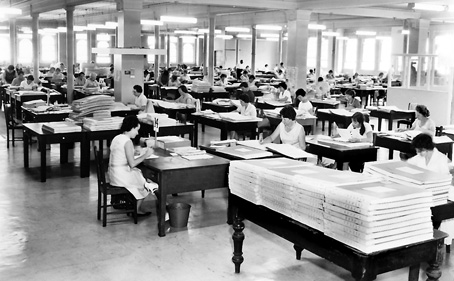 Photograph of the coding floor in 1966 showing many women sitting at rows of desks coding census forms