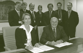 Image: Official signing of the Geocoded National Address File licence