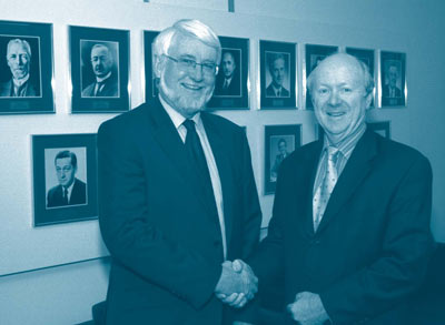 Australian Statistician Brian Pink, and Australian Prudential Regulatory Authority Chairman Dr John Laker, at the signing of a memorandum of understanding, which set out the framework for cooperation between the two agencies