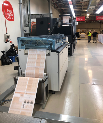 Photo of Census forms being printed