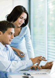 Image: Men & Women on a Lap top