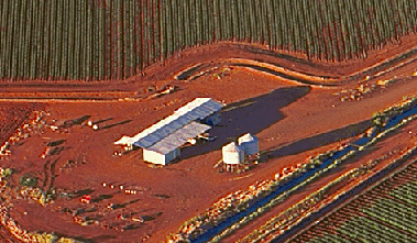 Aerial view of farm sheds and silos