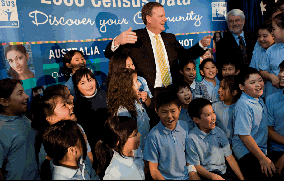 Image: Treasurer Peter Costello rouses the West Richmond Primary School choir, who sang Advance Australia Fair beautifully.