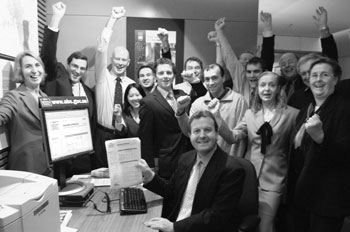 Image: The Hon Chris Pearce MP, Parliamentary Secretary to the Treasurer, with the Deputy Australian Statistician, Susan Linacre, and the ABS Victorian Office staff on the day statistics became free on the web.