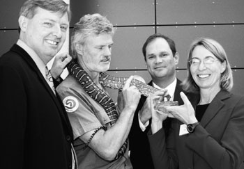Image: Deputy Australian Statisticians Peter Harper, Jonathan Palmer and Susan Linacre with Ross Bennett from the Australian Reptile Centre at the desert themed lauch of 2006 Year Book Australia