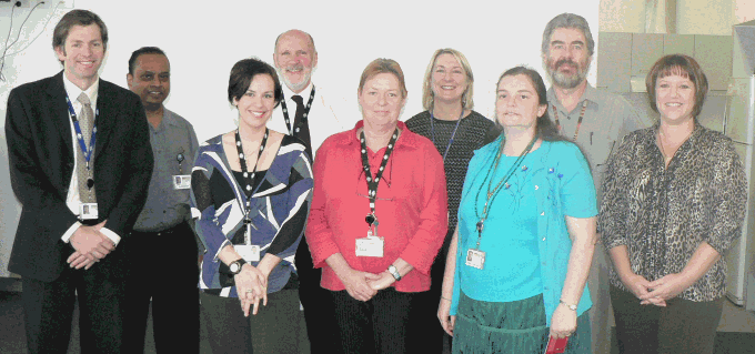 Photo of attendees at the presentation to the winner of the naming competition