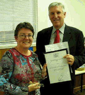 Dennis Trewin, Australian Statistician presenting LEP Excellence Award to Leanne Vincent of TAFE Tasmania #