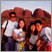 Image- Group of four people in front of Uluru