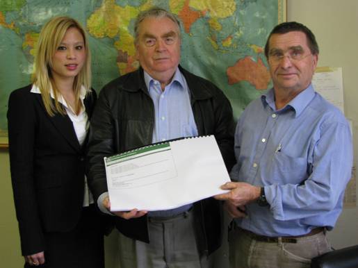 Picture: Valdis Juskevics and Jennie Dunn (ABS ACT office) present the information consultancy report to Dr James Jupp
