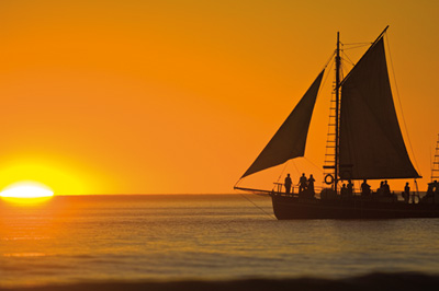 Pearl luggers at sunset off Cable Beach, in Broome (Photo courtesy of Tourism WA)