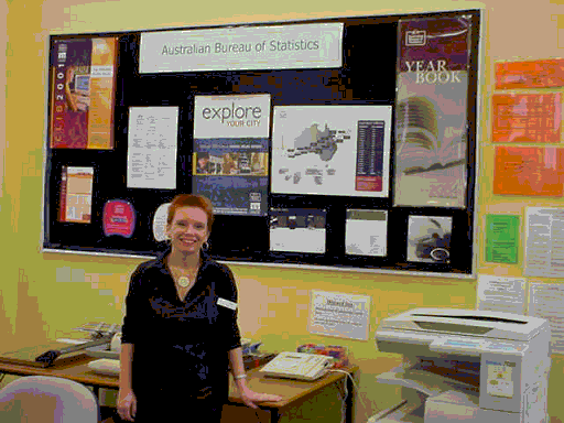Cindy Bissett (Librarian, Launceston TAFE City Campus Library) in front of a recent display to promote the ABS, its products and its services