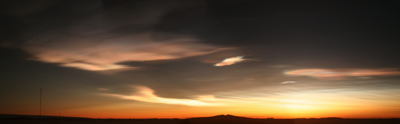 Nacreous clouds showing iridescent colouring with the sun below the horizon – Photography  Renae Baker, Courtesy Australian Government Antarctic Division.