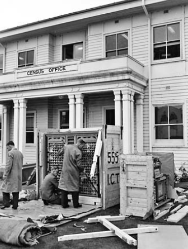 ‘Census Trio’ machines being unpacked from their crates in front of the Census Office in the Jolimont Building in Civic.